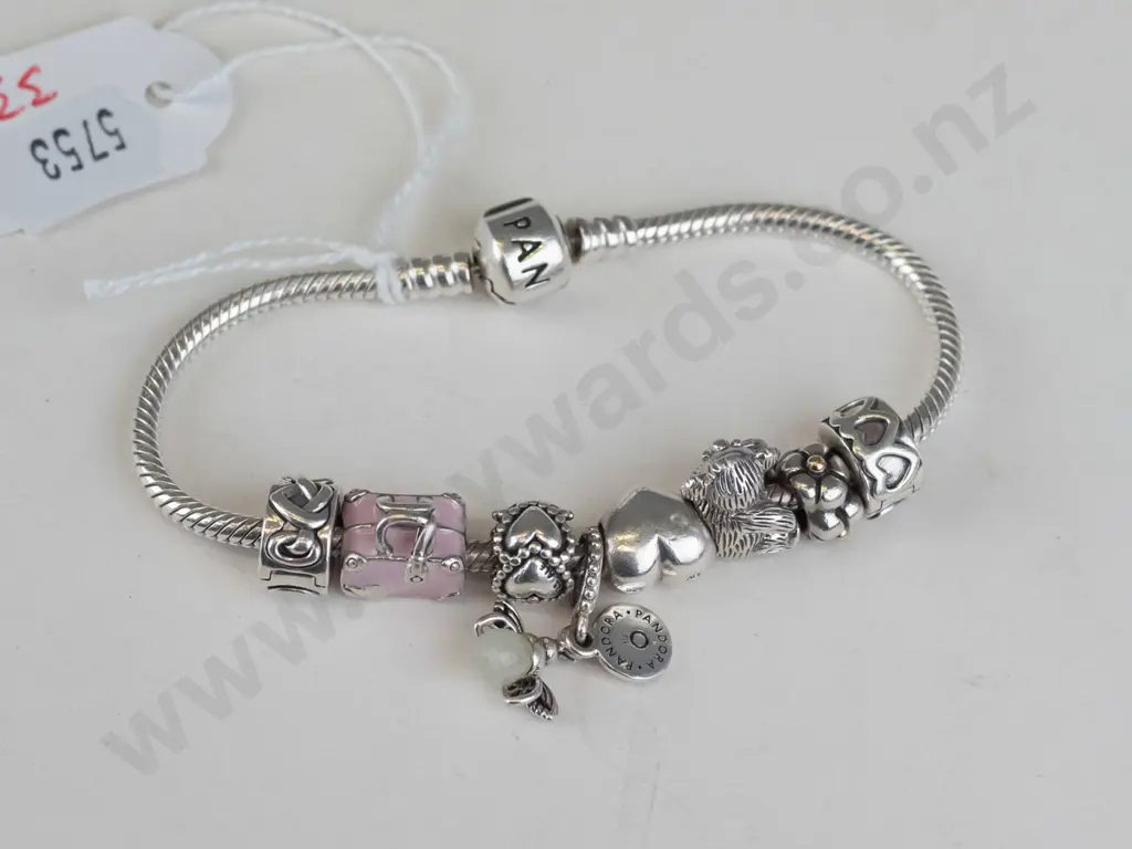 Pandora bracelet, 8 charms including Koala and pink suitcase Image 1++