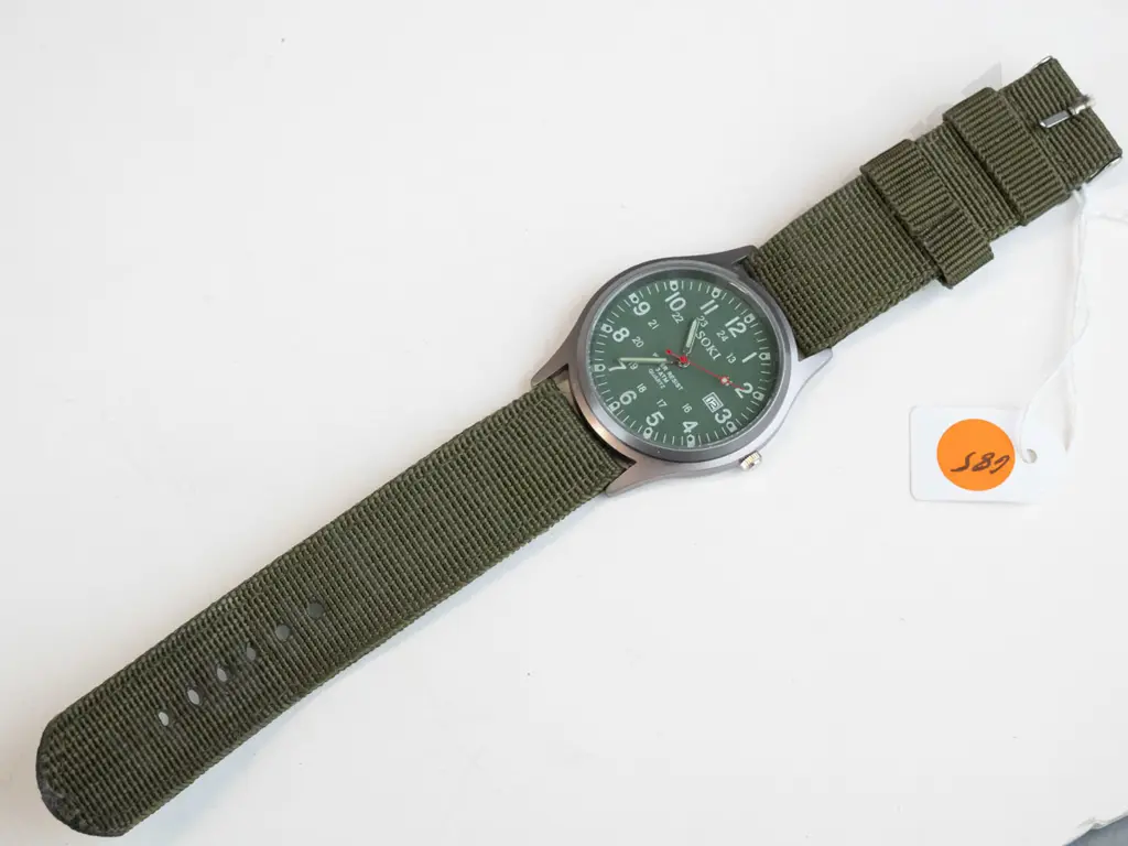 Green fabric strap watch - Soki brand.  Image 1++