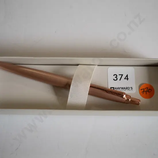 Pink pen in box 