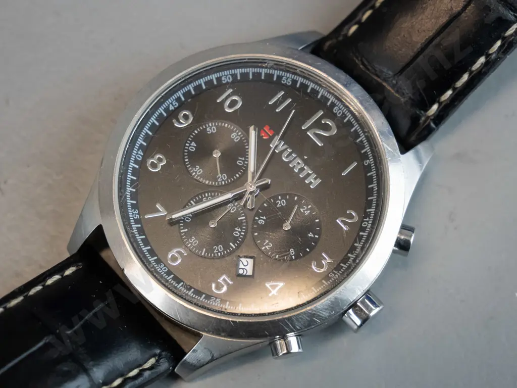 Wurth analogue watch black and silver face, black strap Image 1++