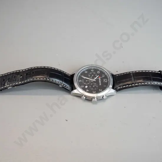 Wurth analogue watch black and silver face, black strap
