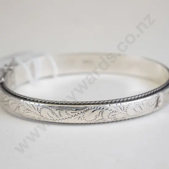 Silver bangle with inscription 'Kathryn love Ynyr'