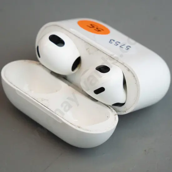 Airpods - Nick Herr, white in charging case