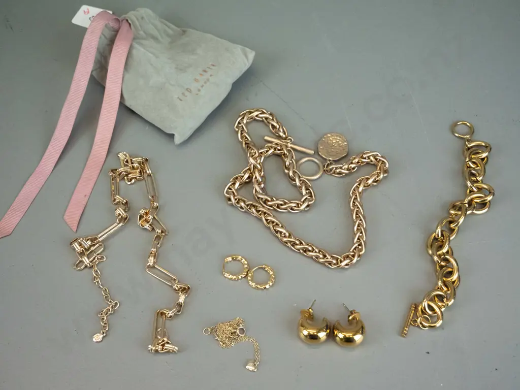 Gold jewellery in grey Ted Baker pouch Image 1++