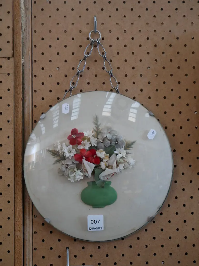 fabric flowers behind convex glass Image 1++