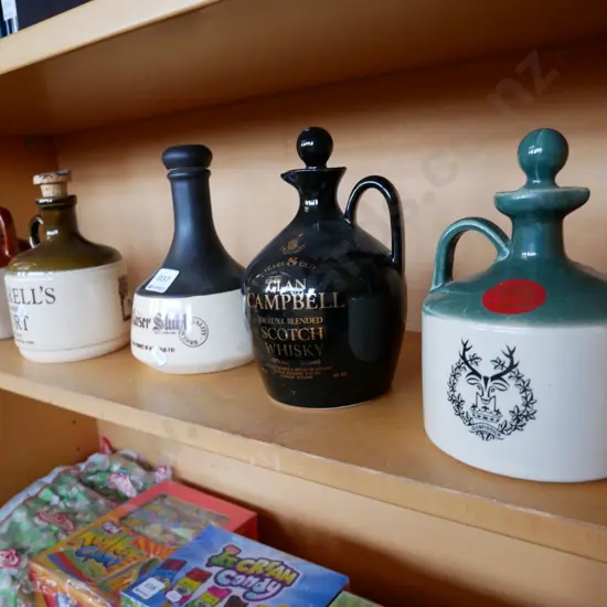 5 ceramic whisky bottles