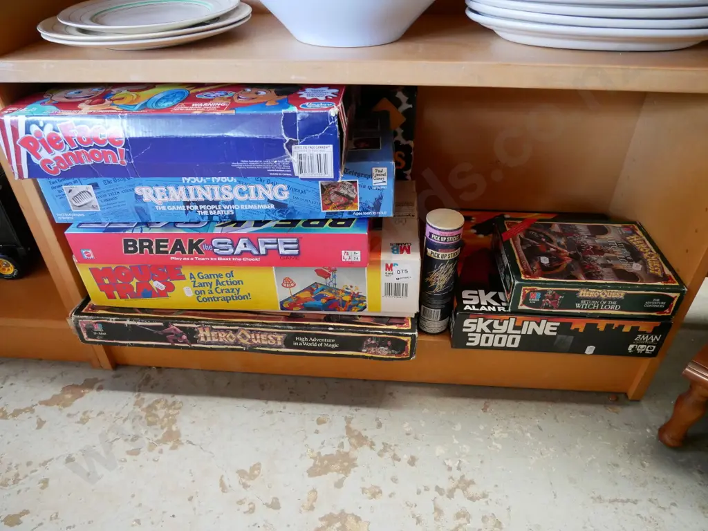 shelf; various board games Image 1++