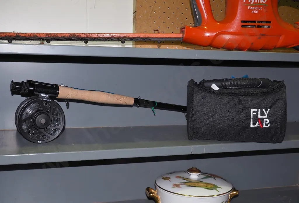 fly fishing rod and reel, cartridges and carry case, as new Image 1++