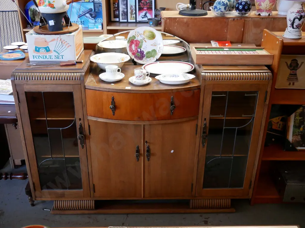 deco sideboard with 2 leadlight doors, 2 slide doors, bow front drawer, small mirror back, some cracks H- 1080, W- 1270, Image 1++