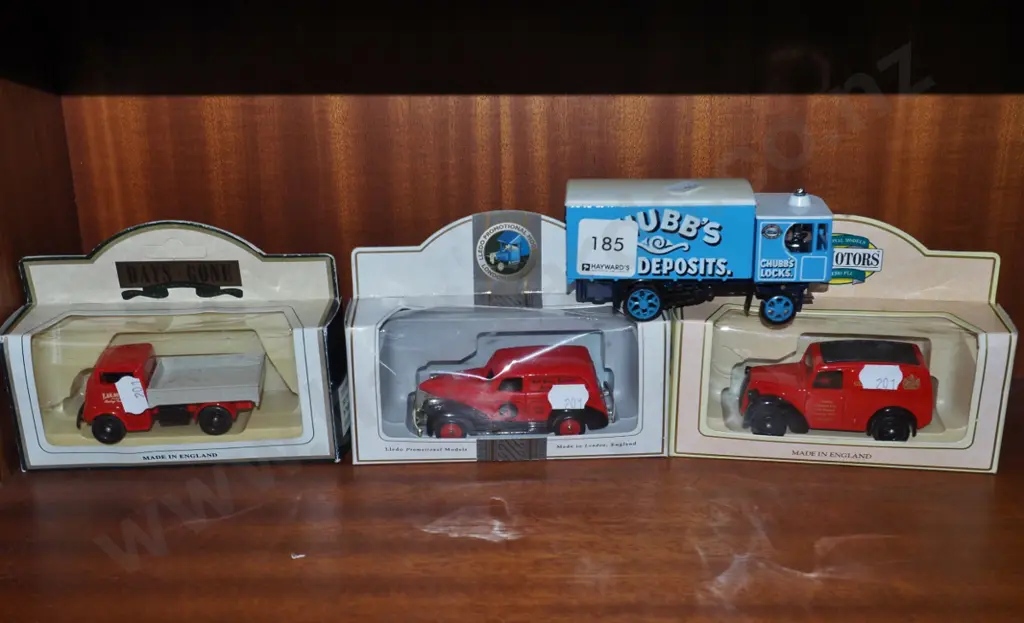 3 boxed and one unboxed toy vehicles Image 1++