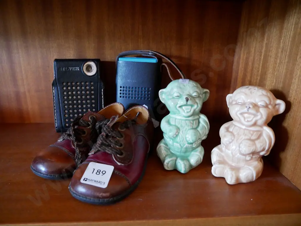 2 transistor radios, ceramic bear figurine, and childs shoes Image 1++