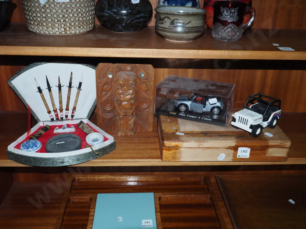 calligraphy set, one carved Maori themed bookend, cigar box and 2 model vehicles Image 1++