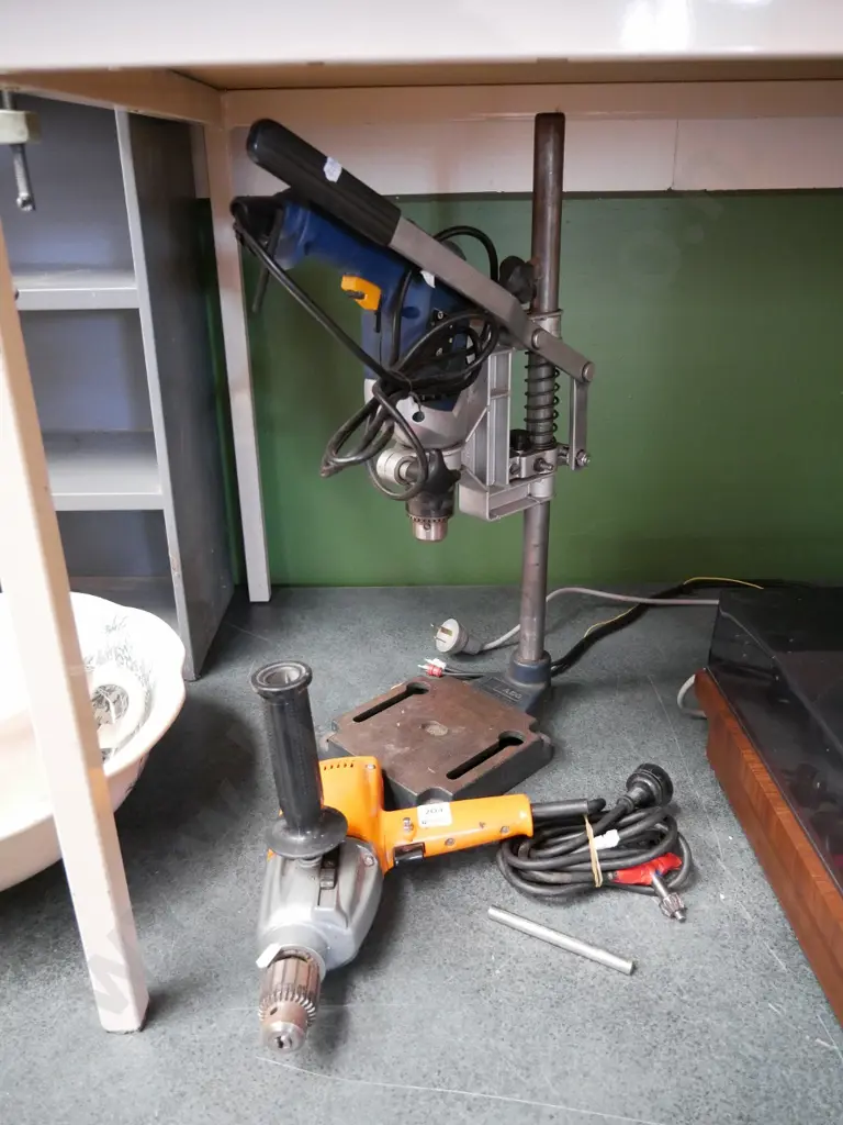 2 electric drills and drill press Image 1++