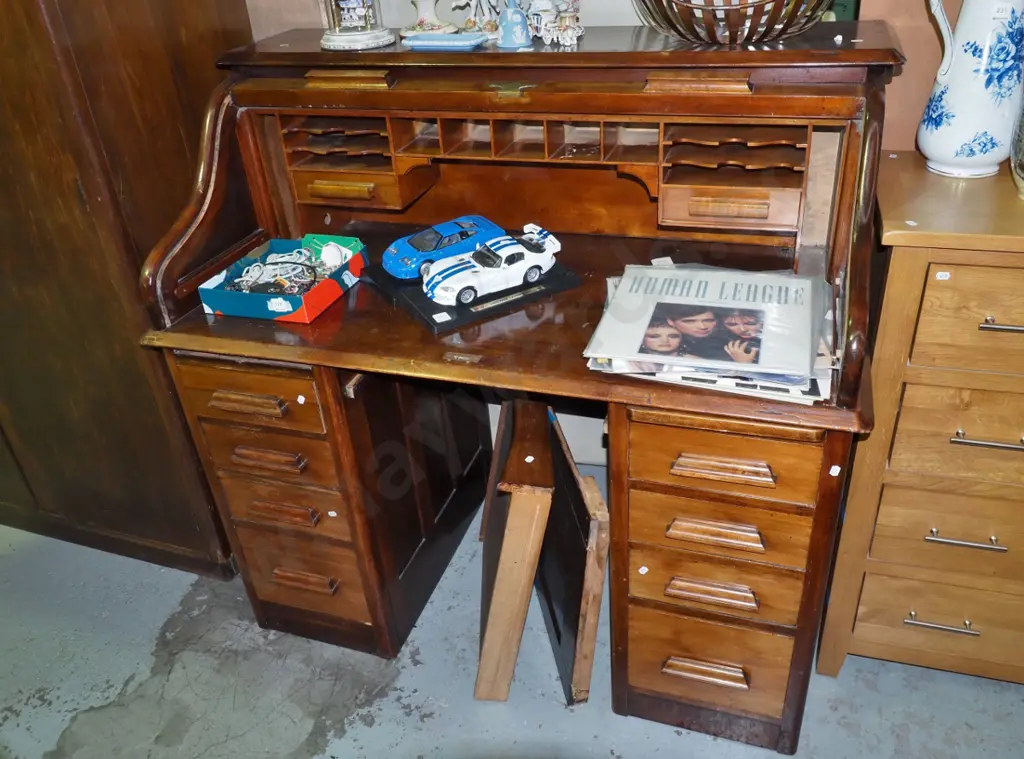 solid kauri rolltop desk with 9 drawers, pull out tray, fitted interior, no lock, H- 1170, W- 1250, D- 700 Image 1++