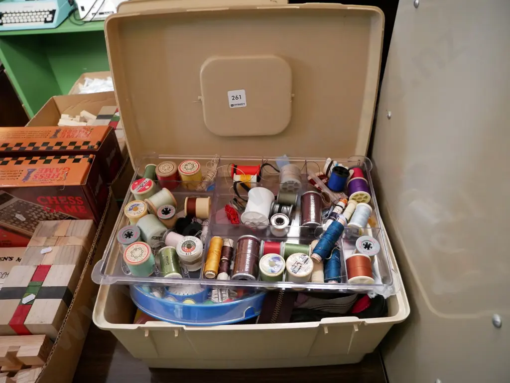 sewing box and contents, zips, thread, binding etc, latches on box are broken Image 1++