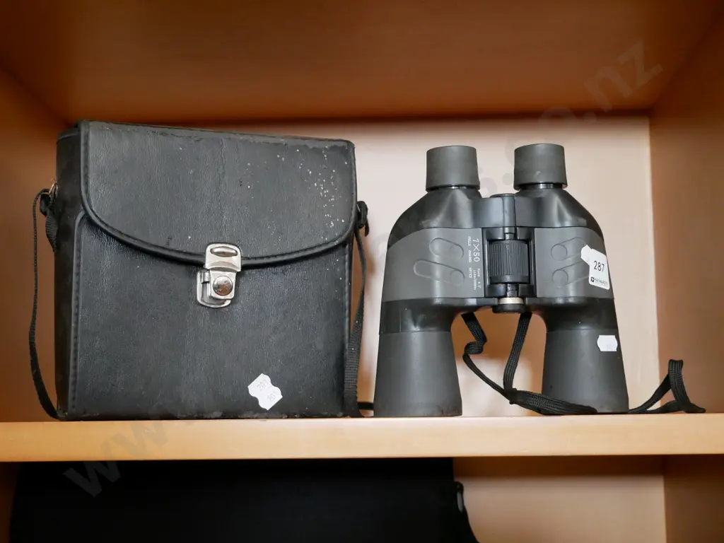 cased 7 x 50 Phenix field binoculars Image 1++