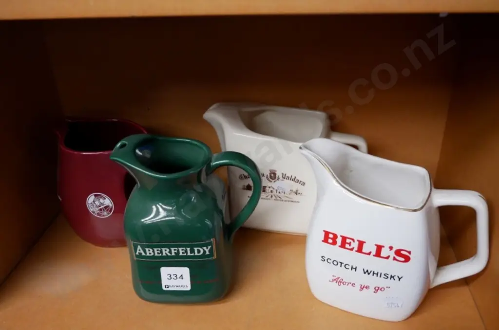 4 whisky jugs Image 1++