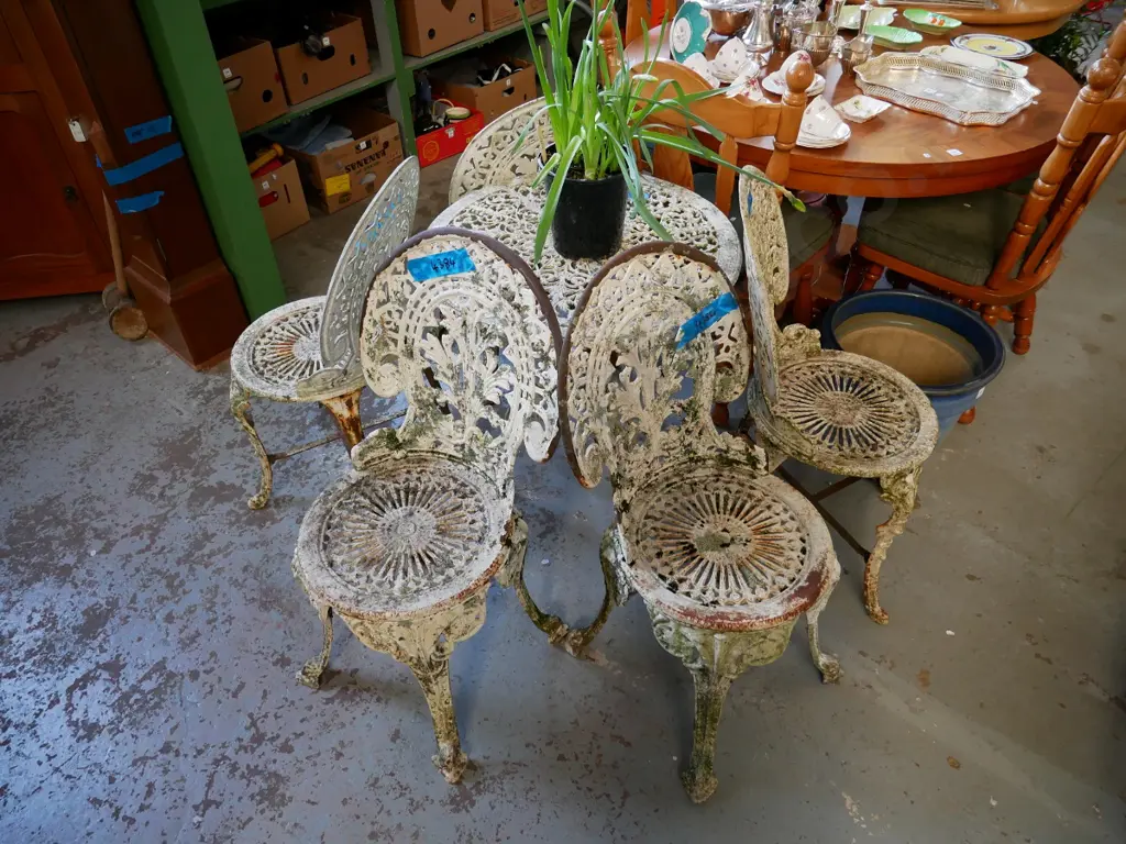 heavy cast alloy outdoor table with 4 cast alloy and cast iron chairs - needs repainting and finishing Image 1++