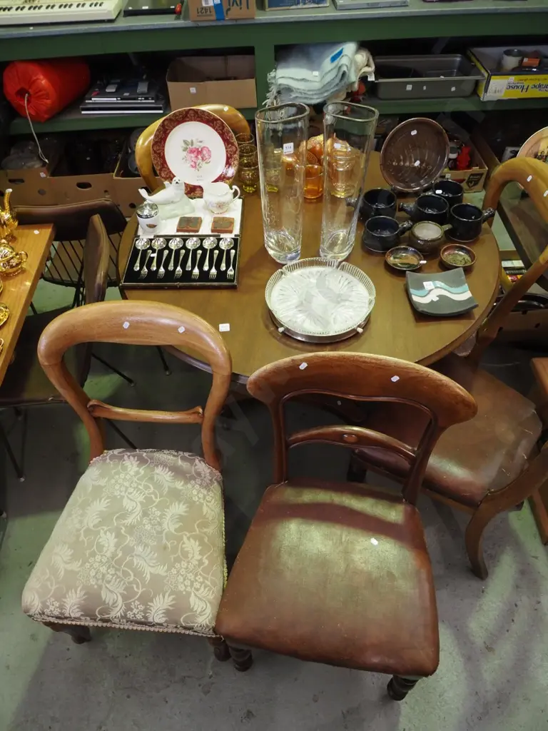 Victorian tilt top loo table on brown enamel casters with 6 mismatched upholstered chairs Image 1++