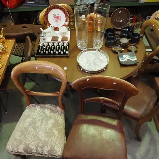 Victorian tilt top loo table on brown enamel casters with 6 mismatched upholstered chairs