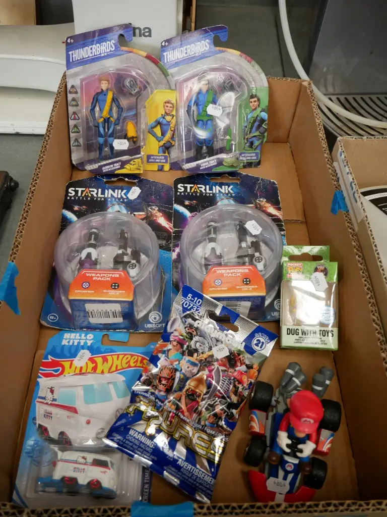 box of figurines and model vehicles Image 1++