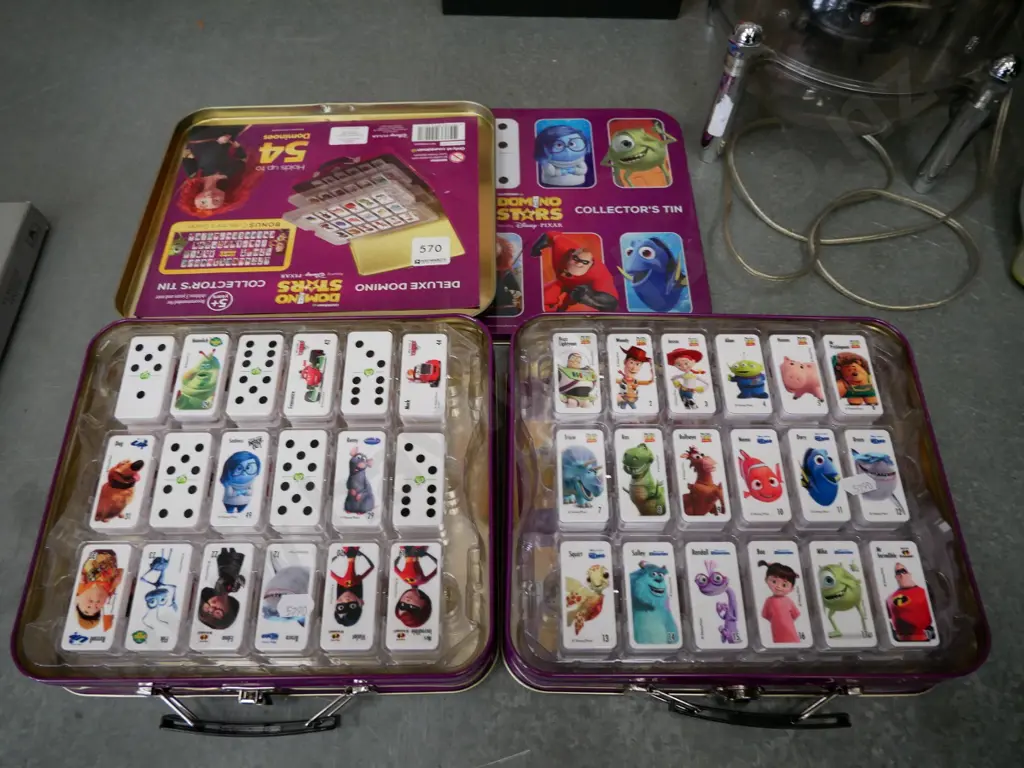 2 collector's tins of Disney's dominoes stars Image 1++