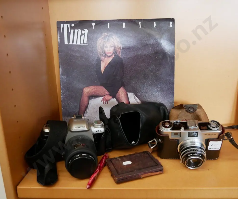 35 mm camera, Tina Turner album, small protractor set Image 1++