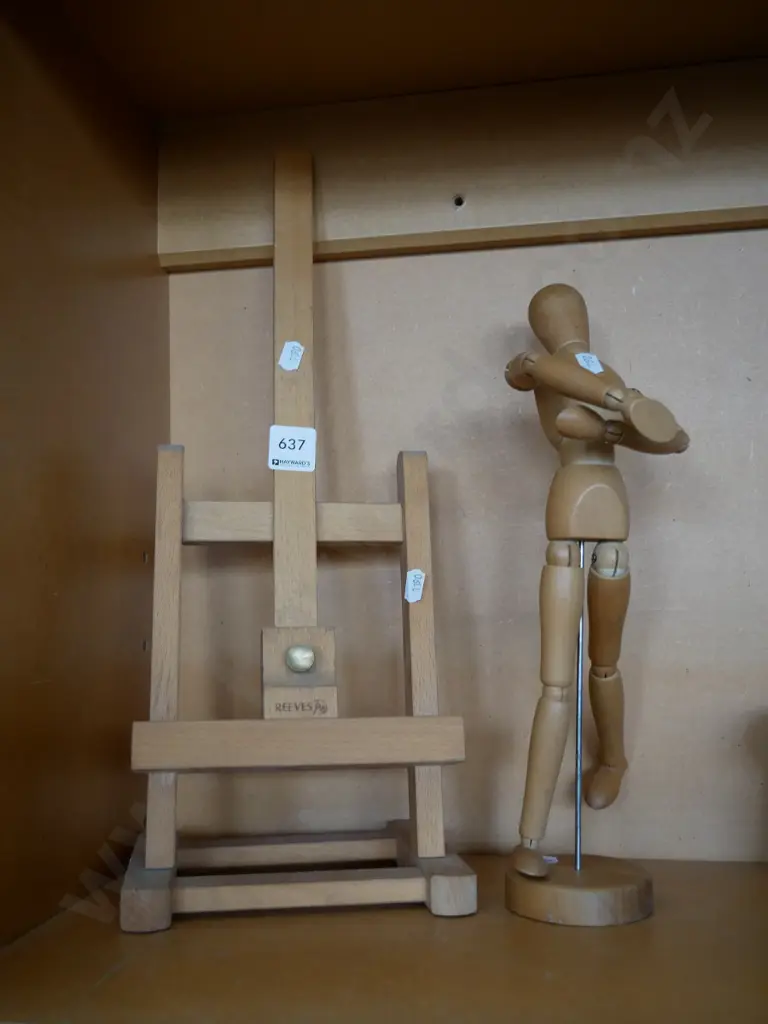 artist's articulated wooden model and easel Image 1++