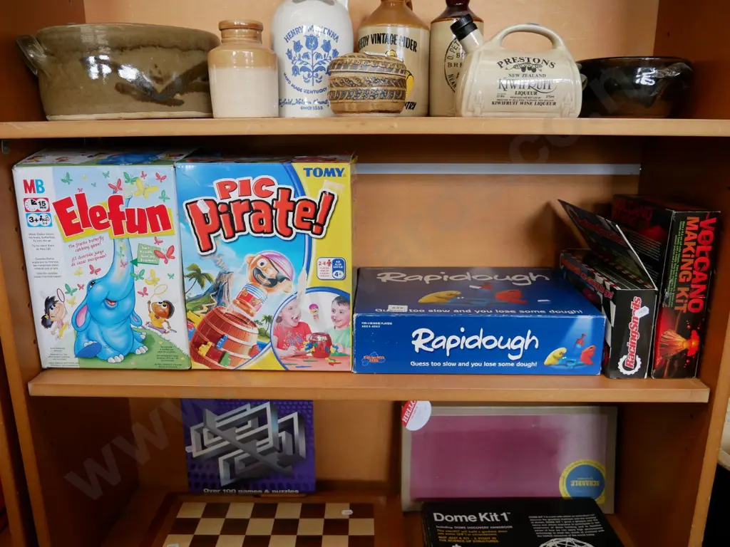shelf; various board games Image 1++
