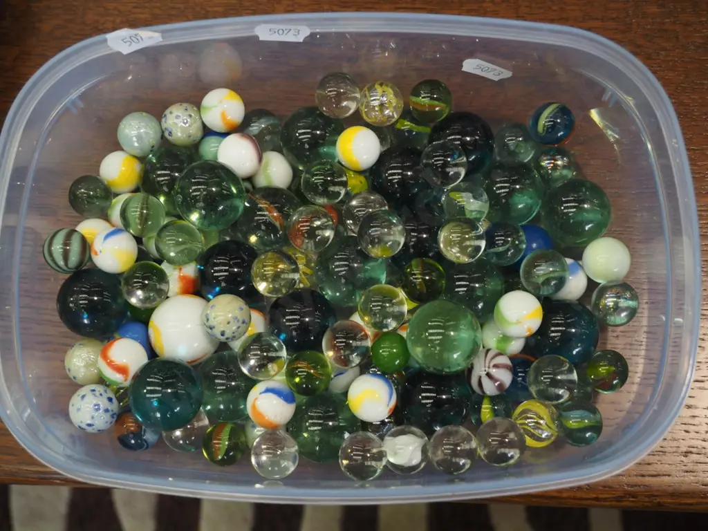 plastic tray of marbles Image 1++