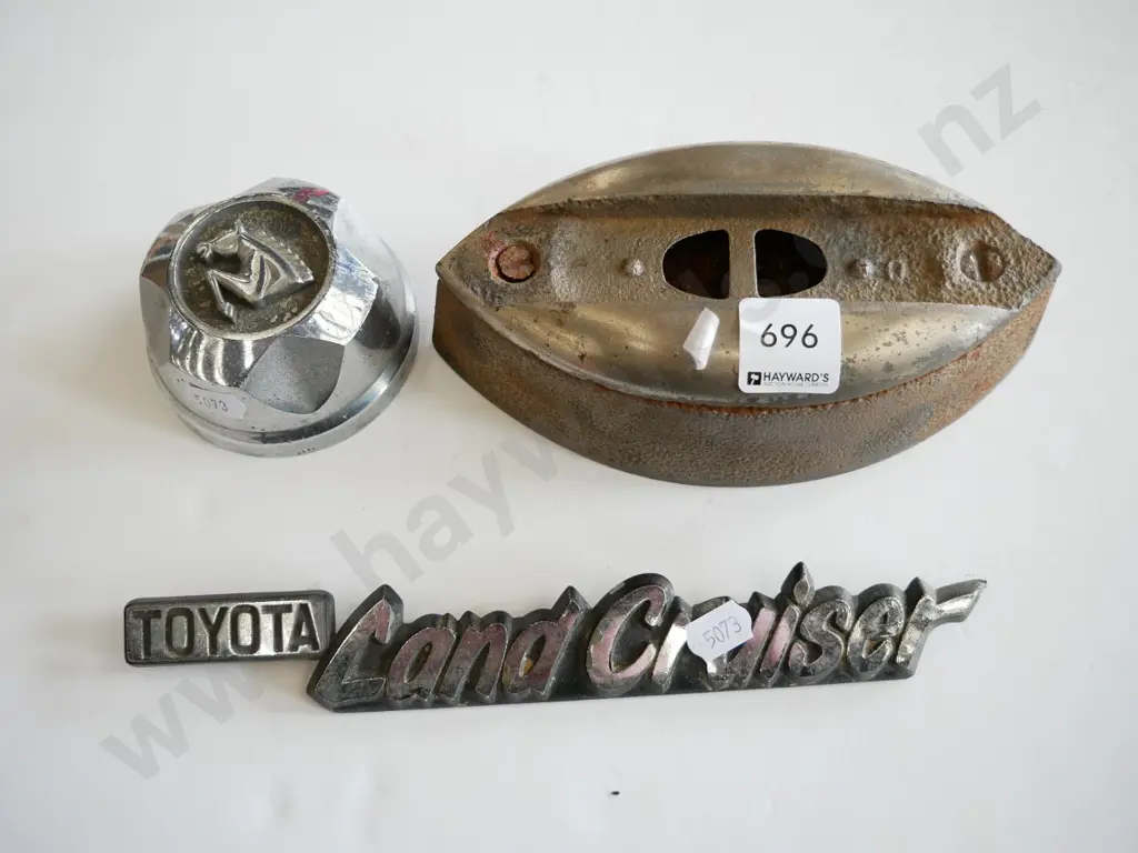 car badge, sad iron and small hub cap Image 1++
