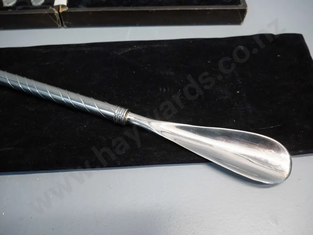 cased set of EPNS fish knives and forks - scratches to knives - and a plated shoehorn L-440 in drawstring bag Image 1++