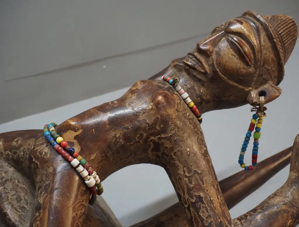 very large African decorative helmet mask with length of rope and various bead adornments. H780 W350 D400 Image 1++