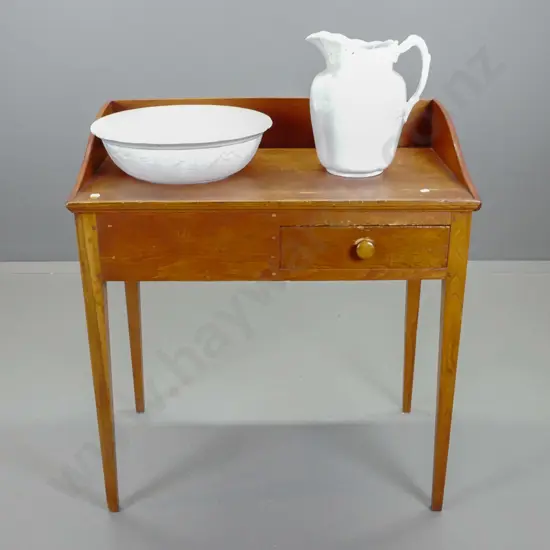 Victorian pine wash stand with backstand, cutout for basin, small drawer, on tapered square legs - has crack to top,