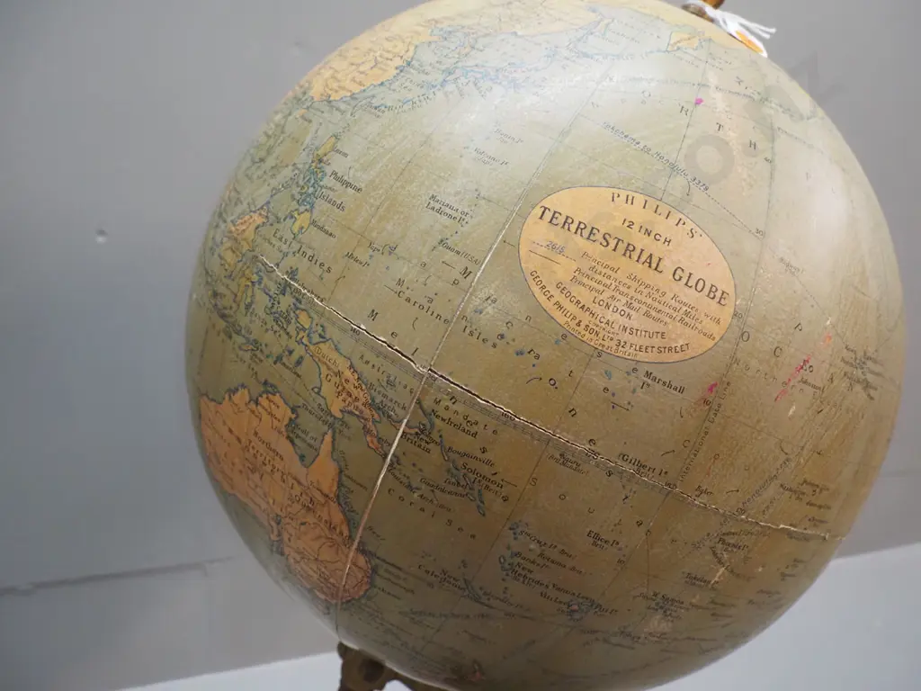 vintage George Philip & Son world globe on heavy cast metal base - crack/separation around seam, some fading Image 1++