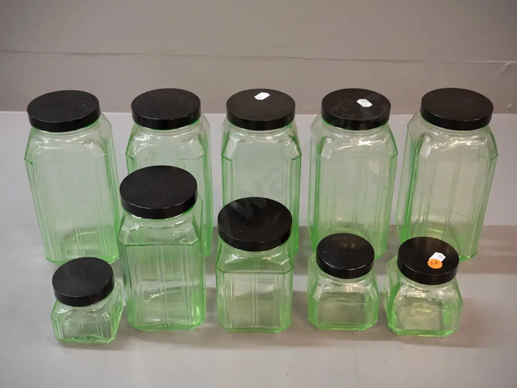 10 uranium glass kitchen storage canisters with bakelite lids - 5 different sizes, largest are H-200 Image 1++
