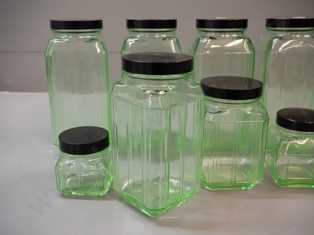 10 uranium glass kitchen storage canisters with bakelite lids - 5 different sizes, largest are H-200 Image 1++