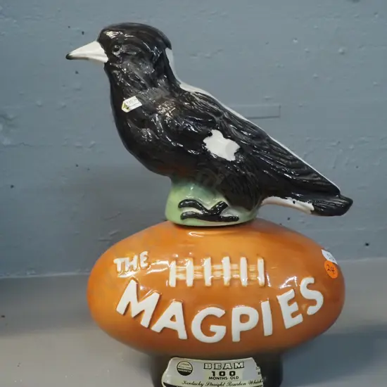 Jim Beam Australian Magpies football decanter - with partial contents H-260 W-200 D-100