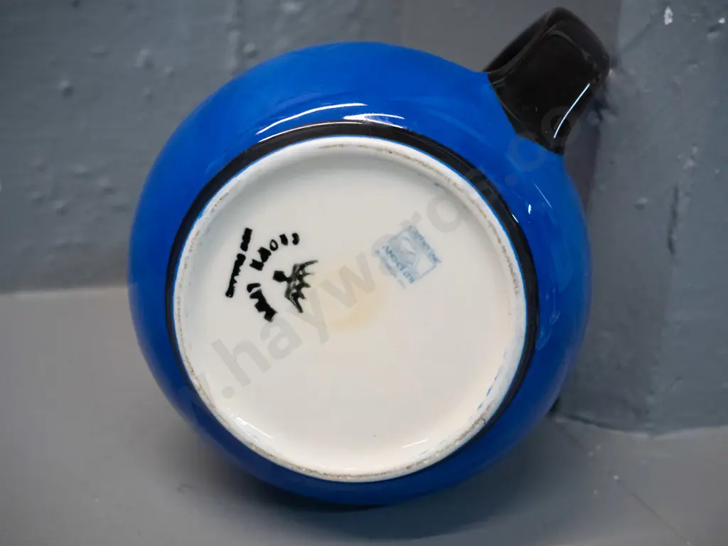 blue and black jug marked Crown Lynn and Catherine Anselmi Aotearoa NZ H-120 W-155 at handle Image 1++