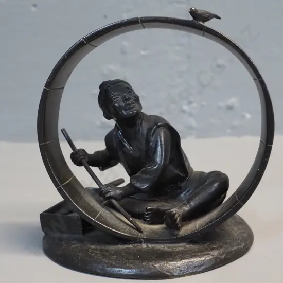 Japanese? small bronze or other cast metal figure of a man with bird H-120 Circle is D-100