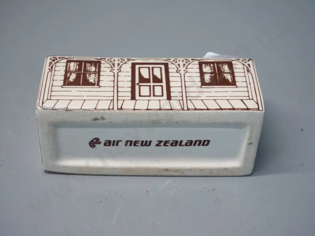 Air New Zealand ceramic bottle in shape of colonial house - with contents, cork looks to be sealed with wax H60 L90 D40 Image 1++