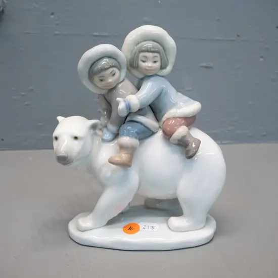 Lladro figure of children with polar bear H-180 W-140