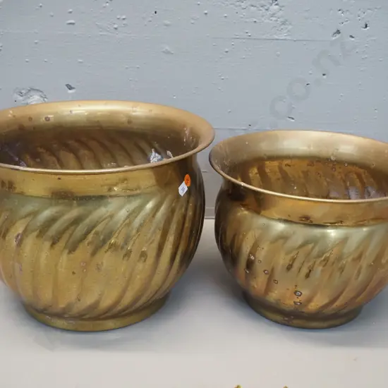 2 large brass swirl pattern jardinieres - some water discolouration inside. Larger one is H-220 D-300