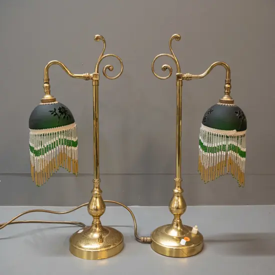pair of reproduction brass table lamps with glass bead fringed shades - discolouration to brass, some fringe drops