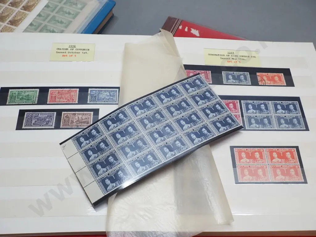 3 stamp albums ranging from 1906 thru 1969, and 3 sheets of ANZAC commemorative stamps. One album is part, 1914 and 1965 Image 1++