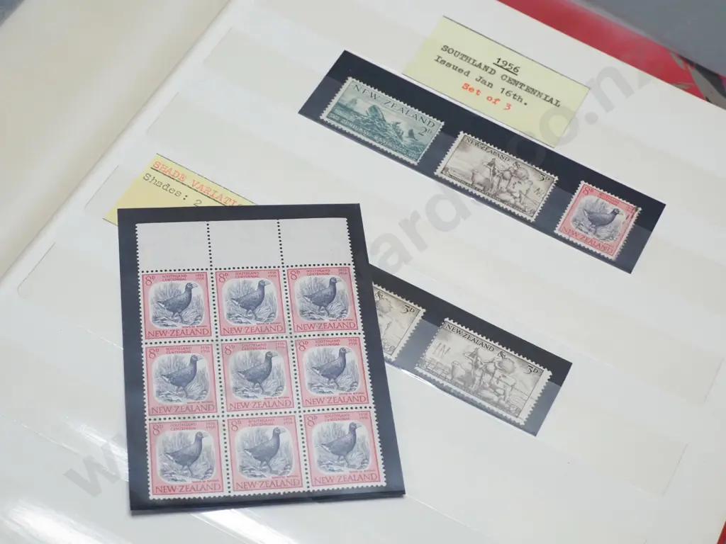 3 stamp albums ranging from 1906 thru 1969, and 3 sheets of ANZAC commemorative stamps. One album is part, 1914 and 1965 Image 1++