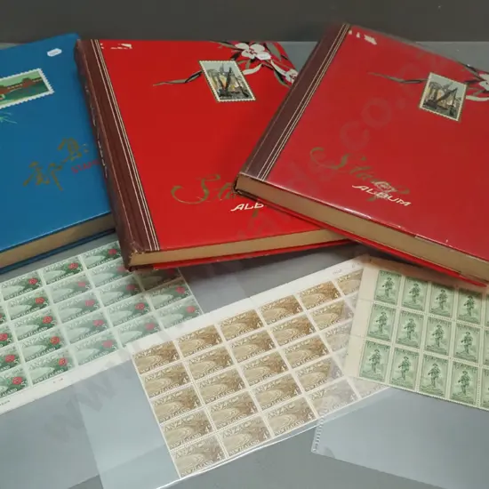 3 stamp albums ranging from 1906 thru 1969, and 3 sheets of ANZAC commemorative stamps. One album is part, 1914 and 1965