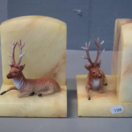 pair of alabaster book-ends with painted cast metal stag figures - Alabaster Industries, England label H-110 L-95 W-80
