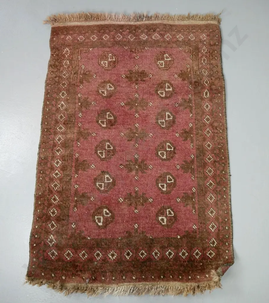 small hand-knotted wool Turkoman style small floor rug - overall fading L-1050 W-700 Image 1++