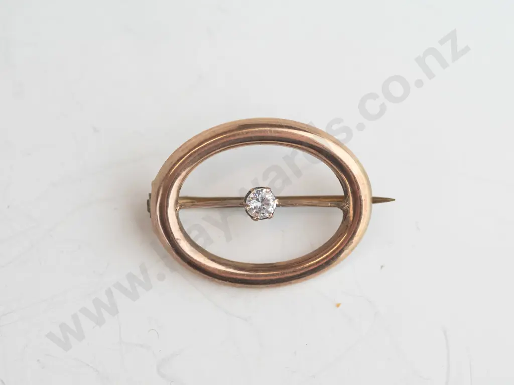 9ct oval brooch, rose gold with white stone, 1.2gms Image 1++